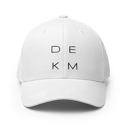 White DEKM Cross Bearer Hat with embroidered DEKM logo on front panel, structured 6-panel design with curved visor.